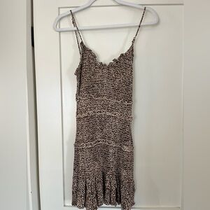 Oliveaceo dress. Cheetah print with ruffle at the bottom